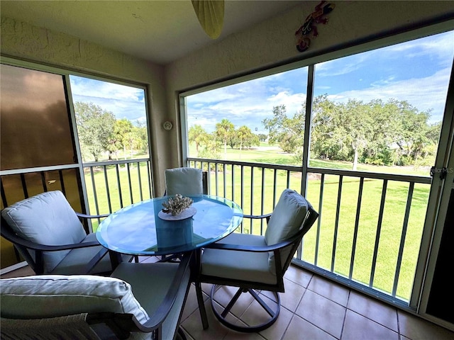 6505 Stone River Rd Unit 309, Bradenton, FL 34203 - sunroom featuring outdoor dining space