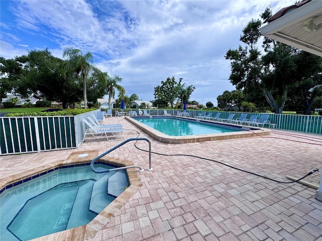 6505 Stone River Rd Unit 309, Bradenton, FL 34203 - community pool featuring a patio area