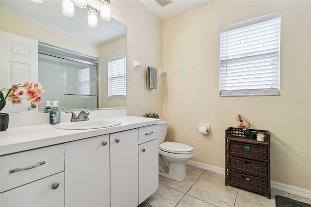 4649 72nd Ct E, Bradenton, FL 34203 - bathroom featuring vanity, a shower with door, tile patterned flooring, and a chandelier