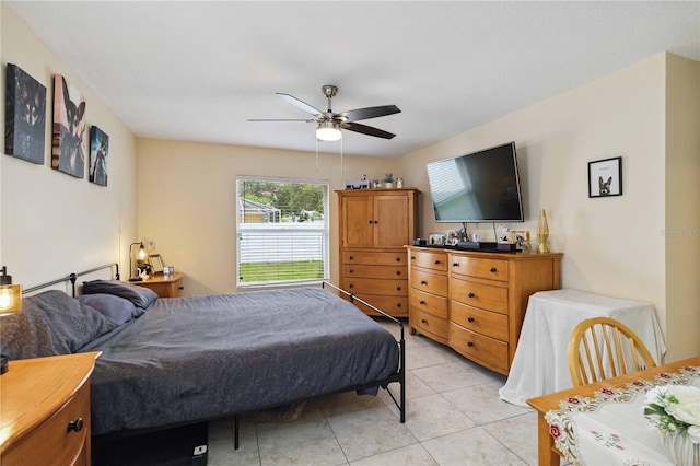 4649 72nd Ct E, Bradenton, FL 34203 - bedroom featuring light tile patterned floors and a ceiling fan