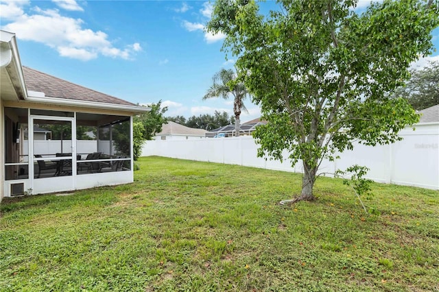 4649 72nd Ct E, Bradenton, FL 34203 - fenced backyard featuring a sunroom