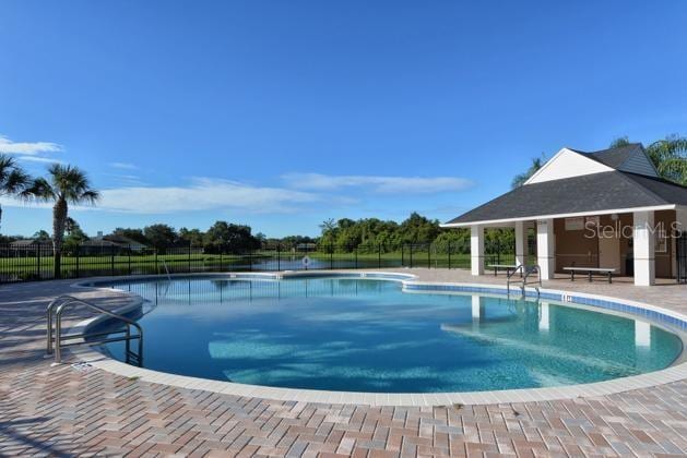 4649 72nd Ct E, Bradenton, FL 34203 - community pool with a patio