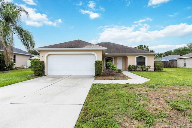 4649 72nd Ct E, Bradenton, FL 34203 - ranch-style house featuring stucco siding, an attached garage, and concrete driveway
