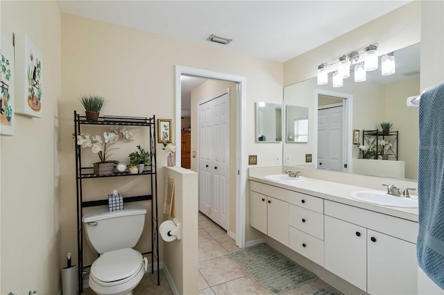 4649 72nd Ct E, Bradenton, FL 34203 - full bathroom featuring double vanity and tile patterned flooring