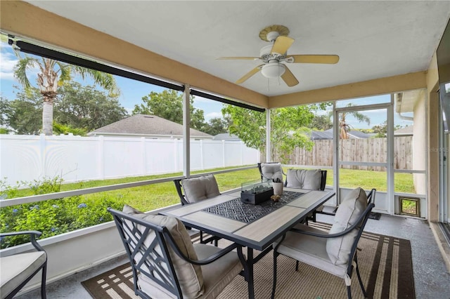 4649 72nd Ct E, Bradenton, FL 34203 - sunroom with ceiling fan, outdoor dining space, and plenty of natural light