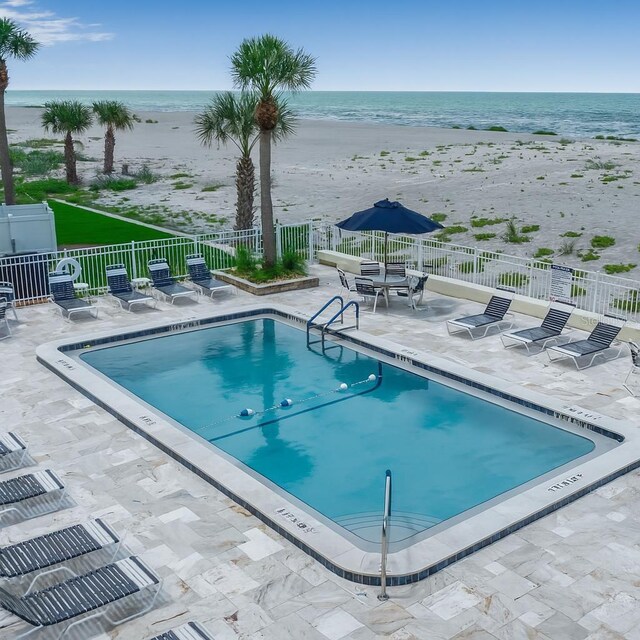 1150 Tarpon Center Dr Unit 1-C # 103, Venice, FL 34285 - community pool with a patio and view of water and beach