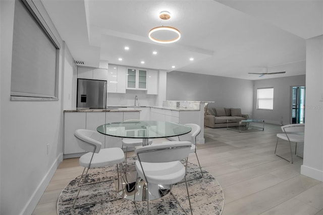 1150 Tarpon Center Dr Unit 1-C # 103, Venice, FL 34285 - dining room featuring recessed lighting, light wood finished floors, and a ceiling fan
