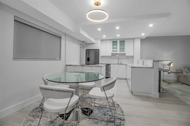 1150 Tarpon Center Dr Unit 1-C # 103, Venice, FL 34285 - dining room with recessed lighting and light wood-type flooring
