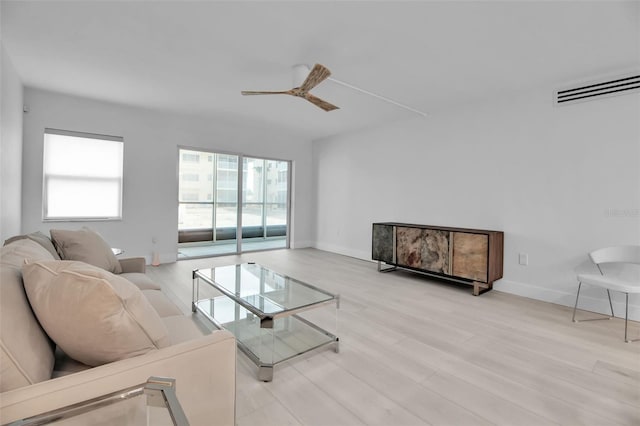 1150 Tarpon Center Dr Unit 1-C # 103, Venice, FL 34285 - living room with a ceiling fan and light wood-style flooring
