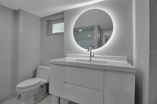 1150 Tarpon Center Dr Unit 1-C # 103, Venice, FL 34285 - bathroom featuring vanity, a textured wall, and a shower