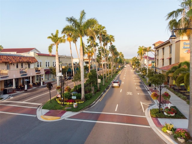 1150 Tarpon Center Dr Unit 1-C # 103, Venice, FL 34285 - view of asphalt street featuring street lighting, sidewalks, a residential view, and curbs