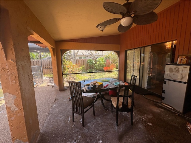 303 70th St NW, Bradenton, FL 34209 - view of patio featuring outdoor dining area and a ceiling fan