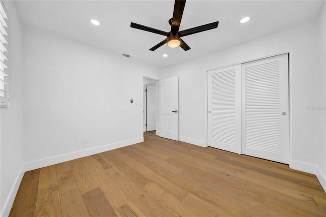 8001 13th Ave S, Saint Petersburg, FL 33707 - unfurnished bedroom featuring light wood-style flooring, recessed lighting, a closet, and ceiling fan
