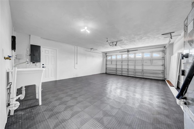 8001 13th Ave S, Saint Petersburg, FL 33707 - garage featuring electric panel