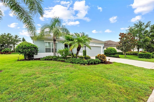 4654 Claremont Park Dr, Bradenton, FL 34211 - view of property hidden behind natural elements featuring stucco siding, driveway, a garage, and a front lawn