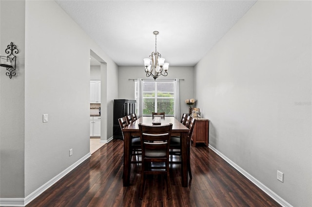 4654 Claremont Park Dr, Bradenton, FL 34211 - dining area with dark wood-type flooring and a chandelier
