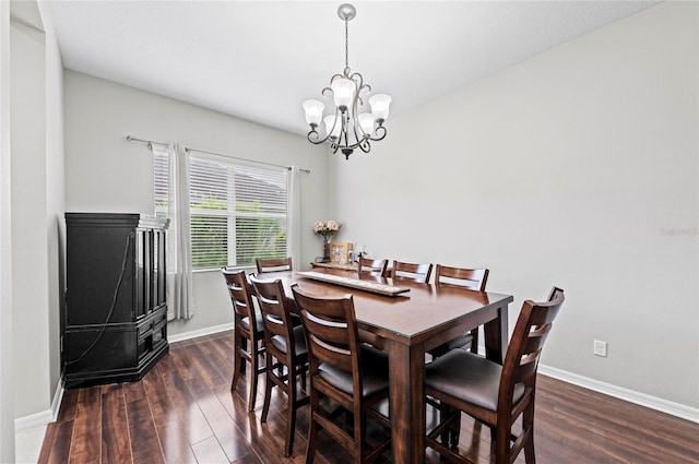 4654 Claremont Park Dr, Bradenton, FL 34211 - dining room featuring a chandelier and dark wood-style flooring