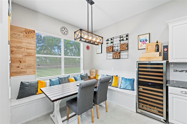 4654 Claremont Park Dr, Bradenton, FL 34211 - dining room featuring wine cooler and a bar