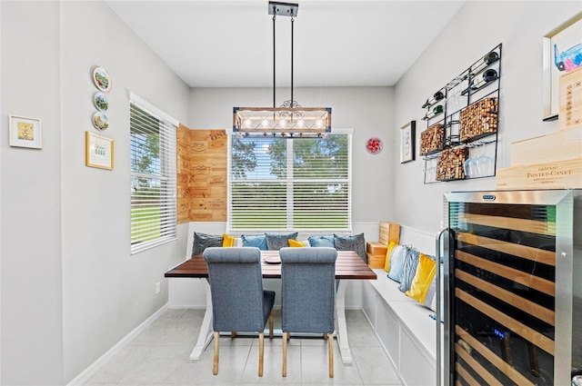 4654 Claremont Park Dr, Bradenton, FL 34211 - tiled dining area featuring breakfast area, wine cooler, and a chandelier