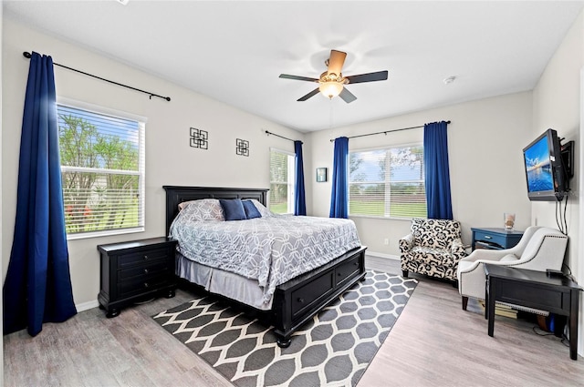 4654 Claremont Park Dr, Bradenton, FL 34211 - bedroom with wood finished floors and a ceiling fan