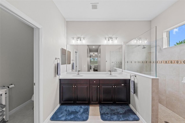 4654 Claremont Park Dr, Bradenton, FL 34211 - bathroom with walk in shower, double vanity, and plenty of natural light