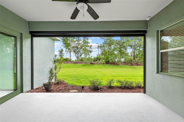 4654 Claremont Park Dr, Bradenton, FL 34211 - view of grassy yard with a patio and a ceiling fan
