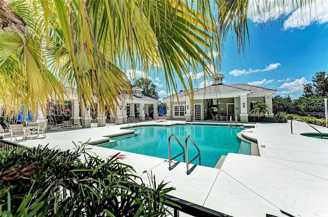 4654 Claremont Park Dr, Bradenton, FL 34211 - community pool featuring a patio