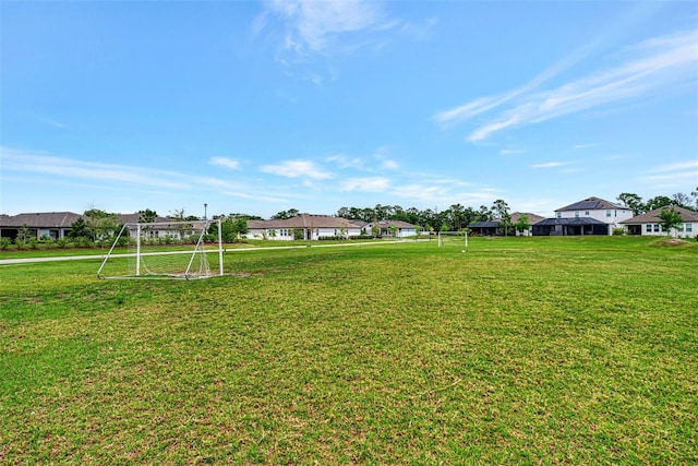 3602 Secret Stroll Dr, Sarasota, FL 34240 - view of yard with a sport area and a residential view