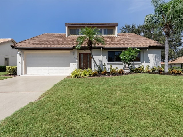 154 Inlets Blvd, Nokomis, FL 34275 - mediterranean / spanish-style home featuring a tiled roof, an attached garage, concrete driveway, stucco siding, and a front lawn