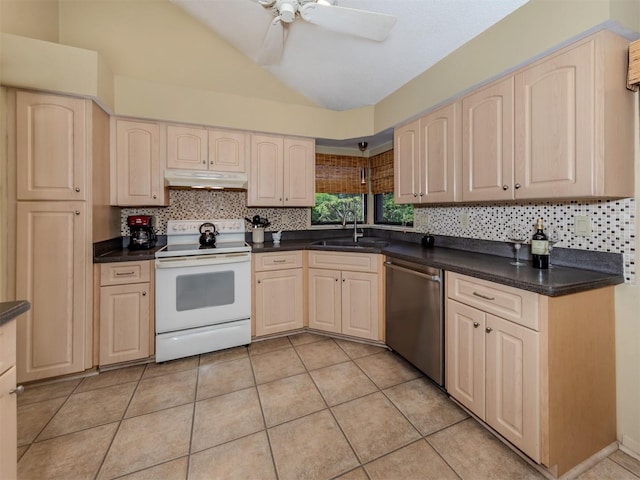 154 Inlets Blvd, Nokomis, FL 34275 - kitchen with white electric range oven, dishwasher, under cabinet range hood, vaulted ceiling, and decorative backsplash