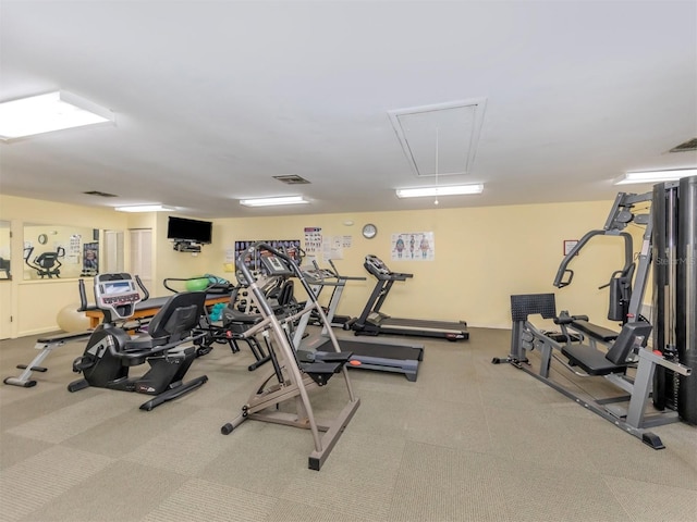 154 Inlets Blvd, Nokomis, FL 34275 - exercise room featuring attic access