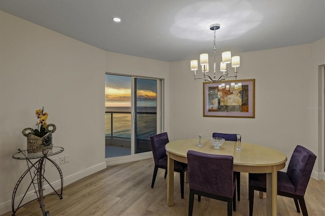 1000 Longboat Club Rd Unit 1105, Longboat Key, FL 34228 - dining room with a chandelier, light wood-type flooring, and recessed lighting