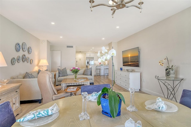 1000 Longboat Club Rd Unit 1105, Longboat Key, FL 34228 - dining area with ceiling fan, light wood-style floors, and recessed lighting