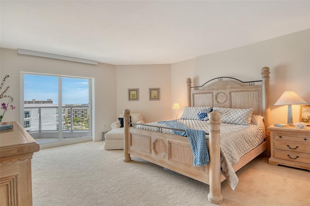 1000 Longboat Club Rd Unit 1105, Longboat Key, FL 34228 - bedroom with carpet flooring and access to exterior
