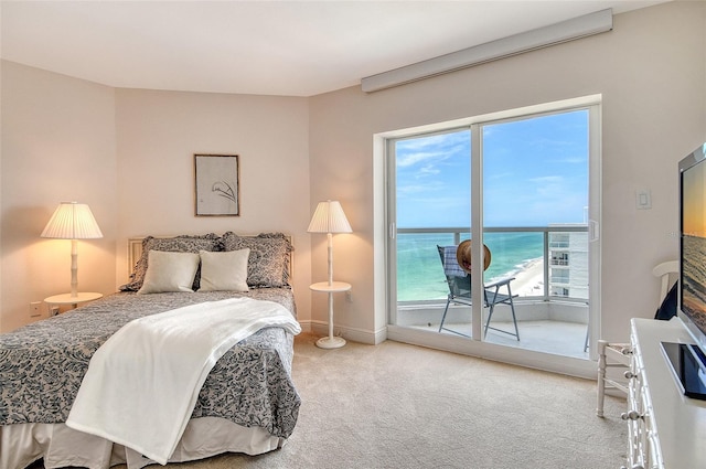1000 Longboat Club Rd Unit 1105, Longboat Key, FL 34228 - carpeted bedroom featuring access to outside and baseboards