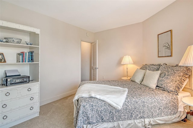 1000 Longboat Club Rd Unit 1105, Longboat Key, FL 34228 - bedroom with light carpet and baseboards