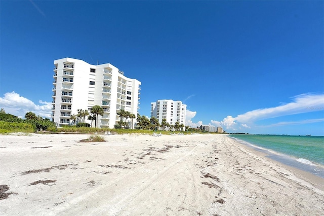 1000 Longboat Club Rd Unit 1105, Longboat Key, FL 34228 - view of apartment building / complex with view of water and beach