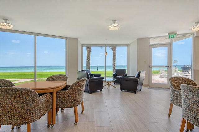 1000 Longboat Club Rd Unit 1105, Longboat Key, FL 34228 - sunroom / solarium featuring a water view