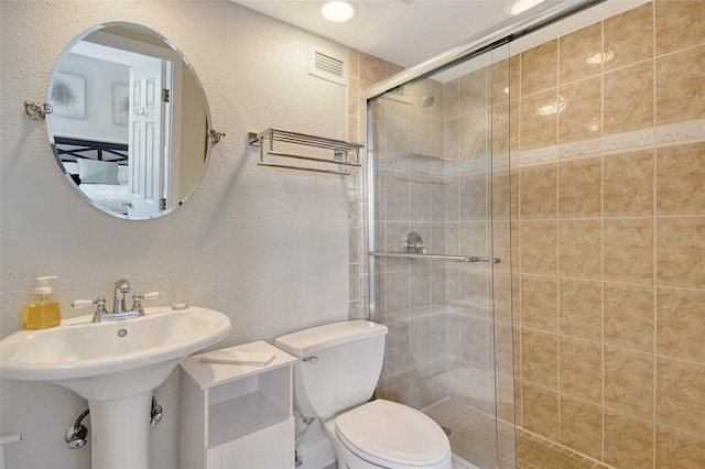 1000 Longboat Club Rd Unit 1105, Longboat Key, FL 34228 - bathroom with a shower stall and a textured wall