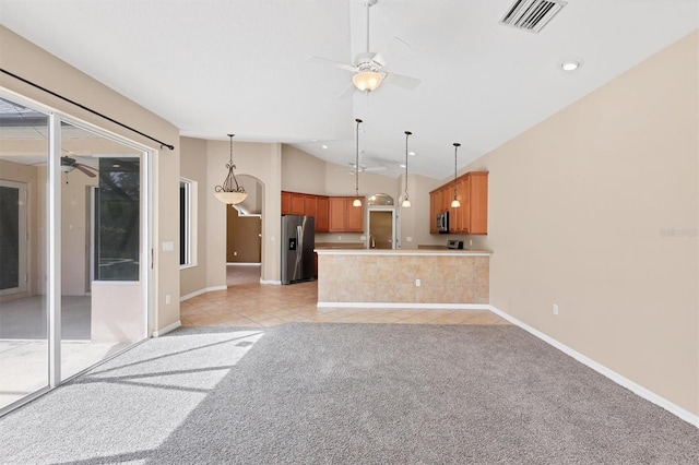 12342 Lavender Loop, Bradenton, FL 34212 - unfurnished living room featuring ceiling fan, light colored carpet, vaulted ceiling, light tile patterned floors, and recessed lighting