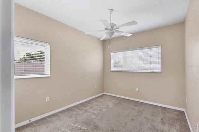 12342 Lavender Loop, Bradenton, FL 34212 - empty room with healthy amount of natural light, carpet, and ceiling fan