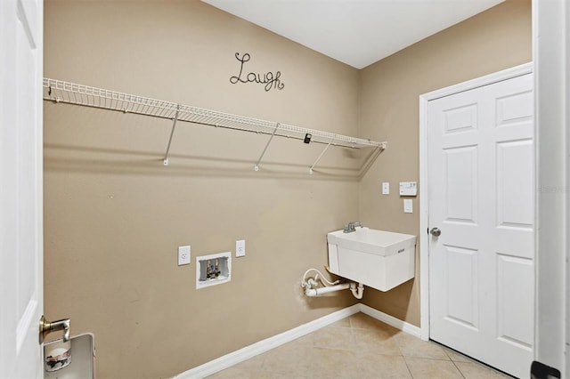 12342 Lavender Loop, Bradenton, FL 34212 - laundry room with hookup for a washing machine and light tile patterned floors