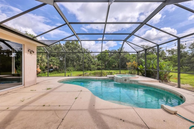 12342 Lavender Loop, Bradenton, FL 34212 - view of swimming pool with a patio area, a pool with connected hot tub, glass enclosure, and view of scattered trees