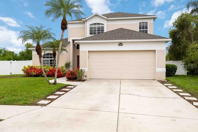4127 Middle River Ter, Ellenton, FL 34222 - traditional home with stucco siding, an attached garage, concrete driveway, and roof with shingles