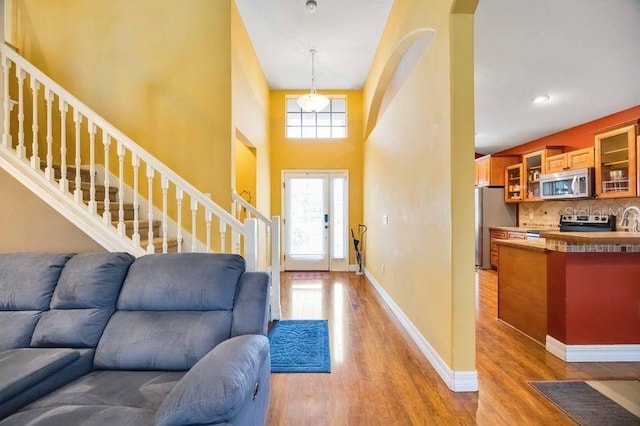 4127 Middle River Ter, Ellenton, FL 34222 - foyer entrance with light wood-style flooring and stairway