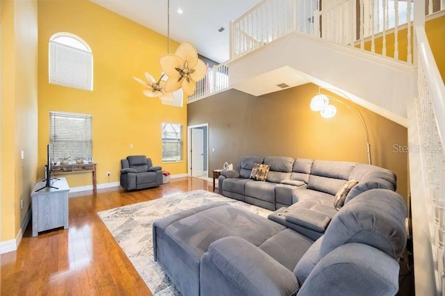 4127 Middle River Ter, Ellenton, FL 34222 - living area with a towering ceiling, wood finished floors, and recessed lighting