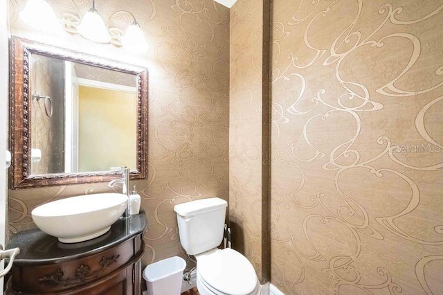 4127 Middle River Ter, Ellenton, FL 34222 - bathroom featuring wallpapered walls and vanity