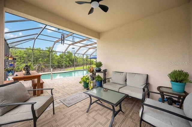 4127 Middle River Ter, Ellenton, FL 34222 - view of patio with an outdoor living space, ceiling fan, an outdoor pool, and glass enclosure
