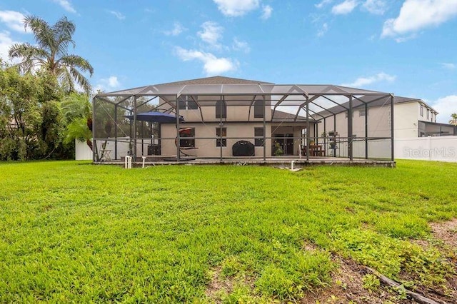 4127 Middle River Ter, Ellenton, FL 34222 - back of house featuring a yard and glass enclosure