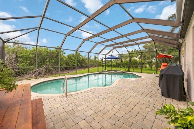 4127 Middle River Ter, Ellenton, FL 34222 - view of swimming pool with a patio, a pool with connected hot tub, and grilling area